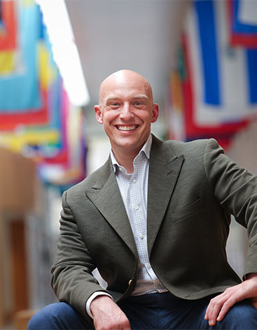 Portrait of Collier Wright, EMBA student at The Fuqua School of Business.