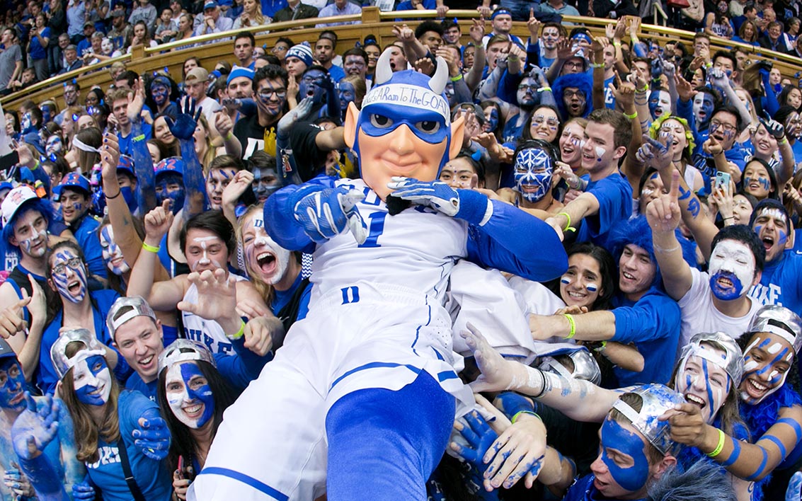 Duke University's Blue Devil mascot crowd surfing in Cameron Indoor Stadium